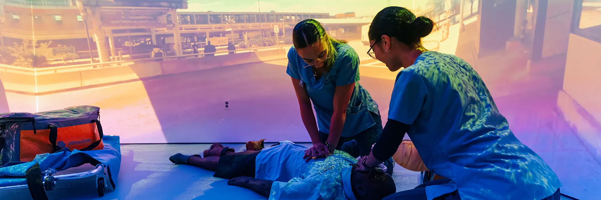 <figure><img src="/media/umassboston/editor-uploads/rooted-amp-rising/2025.5.12NursingVRLabRibbonCutting-57-1920x640.webp" alt="Two nursing students practice cpr on a patient." style="width : -1px; height : -1px;     " /></figure>