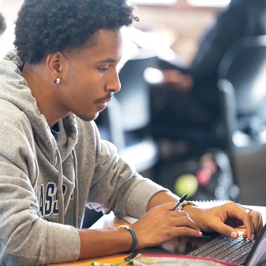 Student working on a laptop